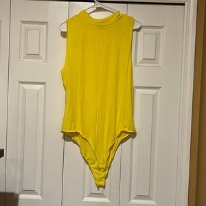 Sleeveless Body suit (Never worn)
